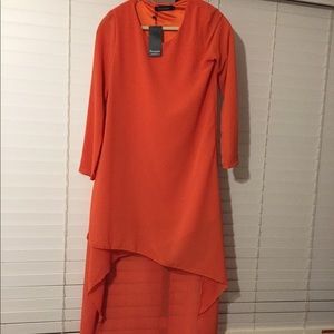 Short front long back dress